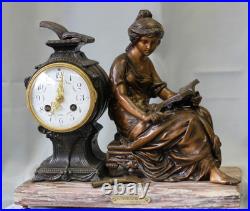 Pendule en régule MOREAU la liseuse sur marbre chiné Pendule en régule MOREAU la liseuse sur marbre chiné