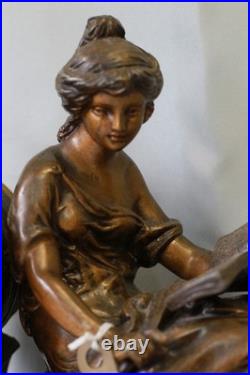 Pendule en régule MOREAU la liseuse sur marbre chiné Pendule en régule MOREAU la liseuse sur marbre chiné