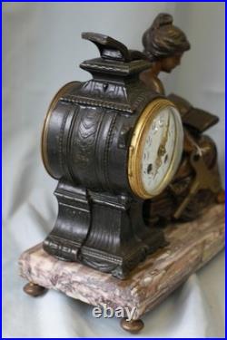 Pendule en régule MOREAU la liseuse sur marbre chiné Pendule en régule MOREAU la liseuse sur marbre chiné