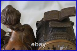 Pendule en régule MOREAU la liseuse sur marbre chiné Pendule en régule MOREAU la liseuse sur marbre chiné