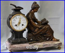 Pendule en régule MOREAU la liseuse sur marbre chiné Pendule en régule MOREAU la liseuse sur marbre chiné