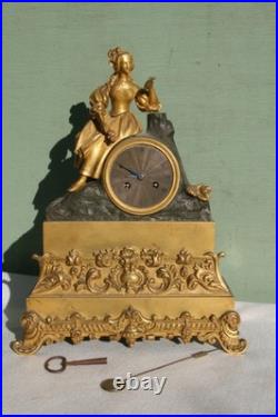 Pendule époque restauration à fil bronze