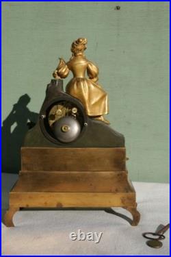 Pendule époque restauration à fil bronze