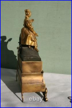 Pendule époque restauration à fil bronze