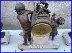 Pendule et GARNITURE DE CHEMINEE en régule marbre décor de chérubin XIXème