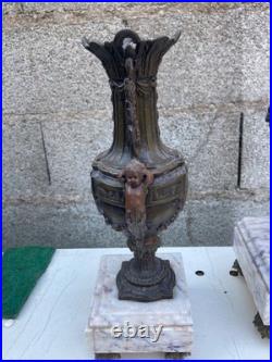 Pendule et GARNITURE DE CHEMINEE en régule marbre décor de chérubin XIXème