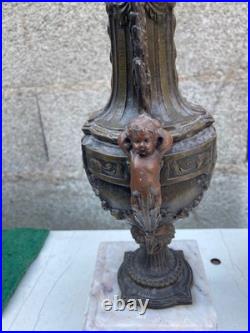 Pendule et GARNITURE DE CHEMINEE en régule marbre décor de chérubin XIXème