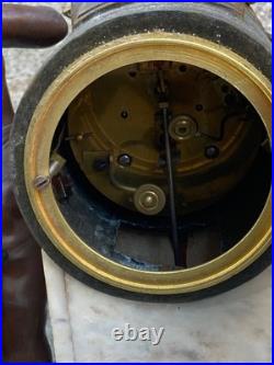 Pendule et GARNITURE DE CHEMINEE en régule marbre décor de chérubin XIXème