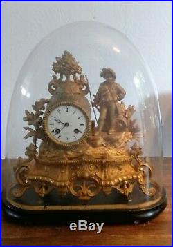 Pendule horloge ancienne sous globe 1855 en régule