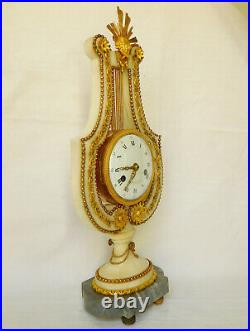 Pendule lyre d'époque Louis XVI en marbre et bronze doré Barancourt à Paris