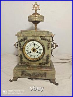 Pendule onyx et et decos bronze fonctionne sonne
