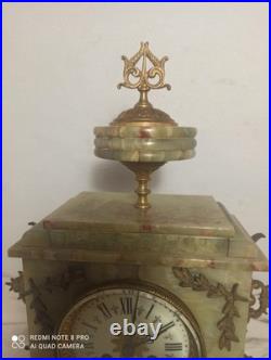 Pendule onyx et et decos bronze fonctionne sonne