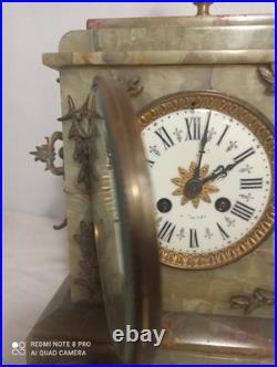 Pendule onyx et et decos bronze fonctionne sonne