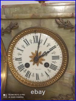 Pendule onyx et et decos bronze fonctionne sonne