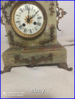 Pendule onyx et et decos bronze fonctionne sonne