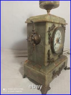 Pendule onyx et et decos bronze fonctionne sonne