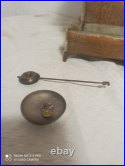 Pendule onyx et et decos bronze fonctionne sonne
