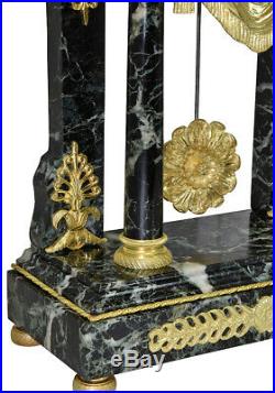 Pendule portique. Kaminuhr Empire clock bronze horloge antique uhren horloge