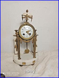 Pendule portique marbre blanc et bronze dore fonctionne sonne