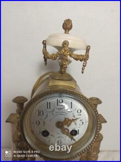 Pendule portique marbre blanc et bronze dore fonctionne sonne