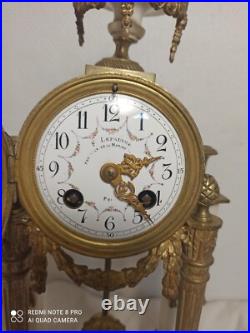 Pendule portique marbre blanc et bronze dore fonctionne sonne