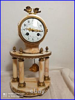 Pendule portique st Louis XVI marbre bronze dore fonctionne sonne