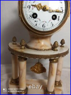 Pendule portique st Louis XVI marbre bronze dore fonctionne sonne