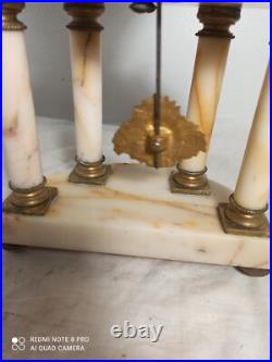 Pendule portique st Louis XVI marbre bronze dore fonctionne sonne