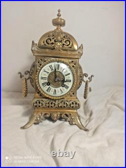 Pendule style baroque bronze fonctionne sonne