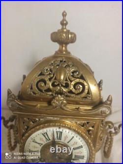 Pendule style baroque bronze fonctionne sonne