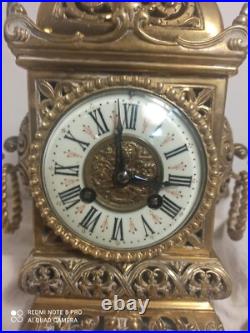 Pendule style baroque bronze fonctionne sonne