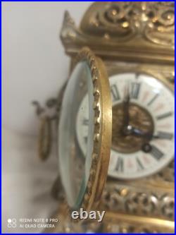Pendule style baroque bronze fonctionne sonne