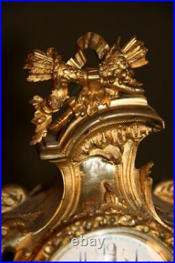 Petite pendule en bronze style louis XV vers 1900