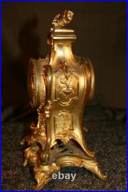Petite pendule en bronze style louis XV vers 1900