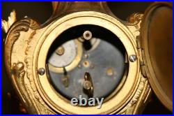 Petite pendule en bronze style louis XV vers 1900