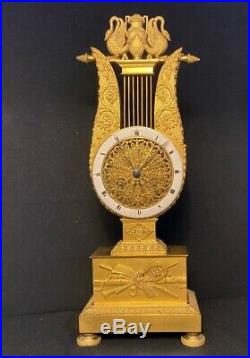 Rare pendule empire Lyre en bronze doré. (French ormolu Clock)
