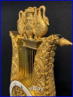Rare pendule empire Lyre en bronze doré. (French ormolu Clock)