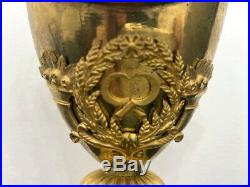 Superbe pendule Empire bronze doré forme vase