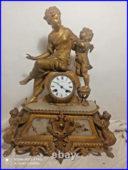 Tres grande pendule regule dore ressorts ok fonctionne sonne