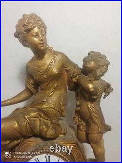 Tres grande pendule regule dore ressorts ok fonctionne sonne