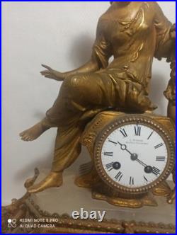 Tres grande pendule regule dore ressorts ok fonctionne sonne