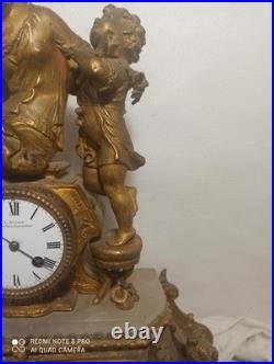 Tres grande pendule regule dore ressorts ok fonctionne sonne