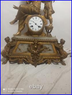 Tres grande pendule regule dore ressorts ok fonctionne sonne