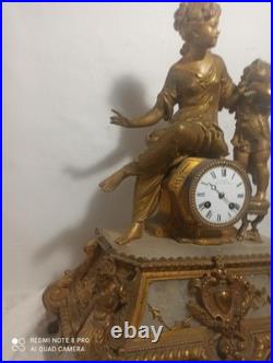 Tres grande pendule regule dore ressorts ok fonctionne sonne